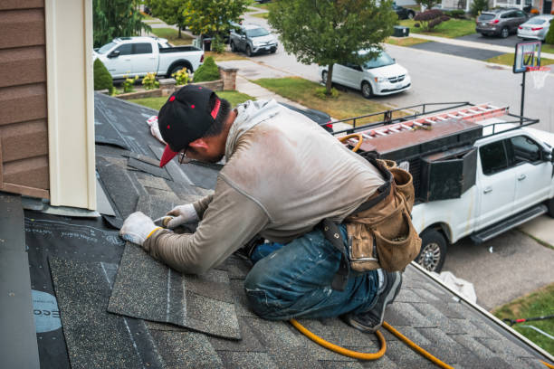 Professional Roof Replacement technician working in Akron, NY